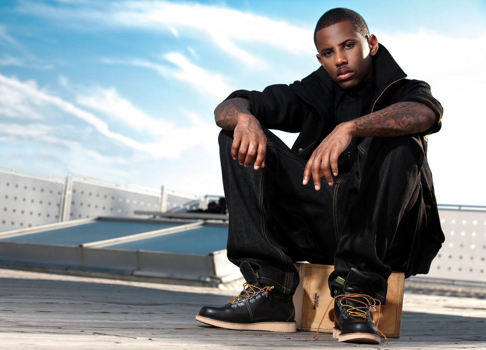 Fabolous in a Rich Yung campaign on a rooftop
